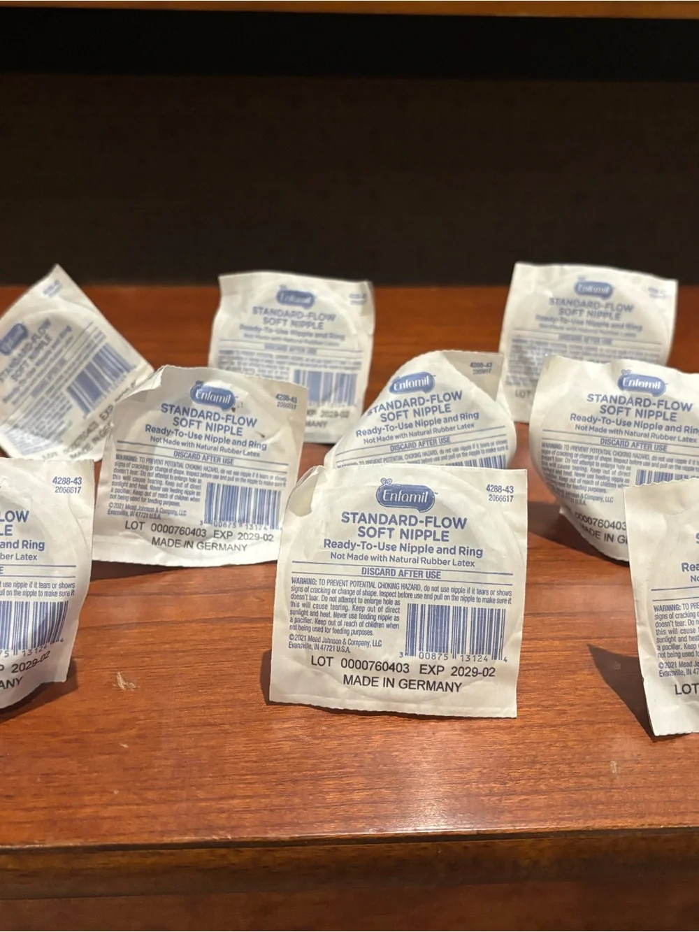 Baby Bottle nipples (standard flow) and 9 sterilized Grad-u-feed nursers